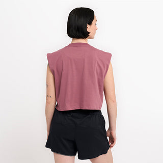 back view of ciele athletics women cropped ORTShirt with love logo in deco rose color on a model